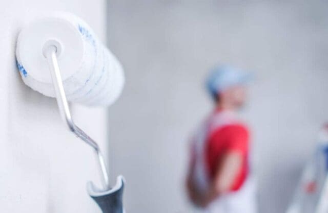 Painting Decorating In Hampshire Painter decorating a room in Hampshire