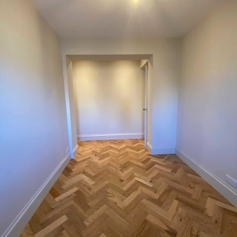 Hallway painting and flooring in Farnham