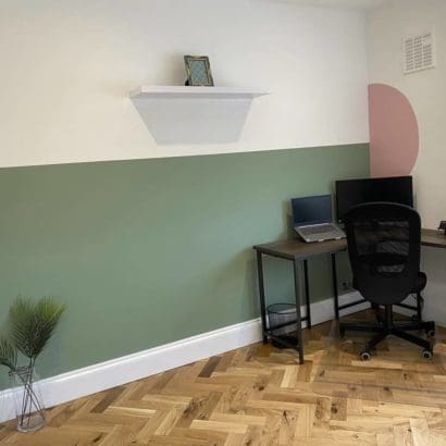 Home office with two tone interior walls decorated by office painters