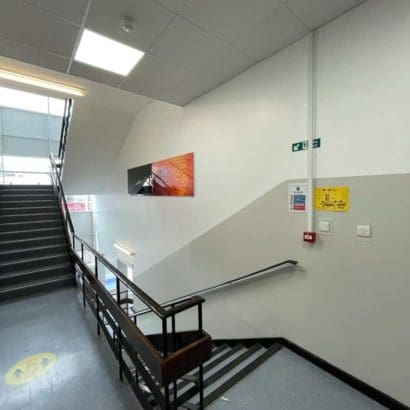 School hallway with two tone painted interior walls
