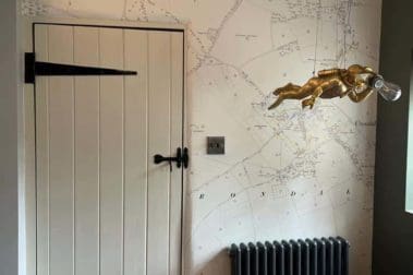 historical property in guildford with freshly painted internal door and rustic map wallpaper