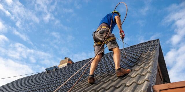 Commercial Spray Painter Exterior commercial spray painter spraying roof tiles