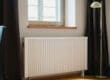 painting behind white radiator in home renovation