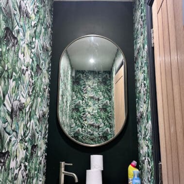 Installed tropical-themed wallpaper in a compact WC in Farnborough, Surrey.