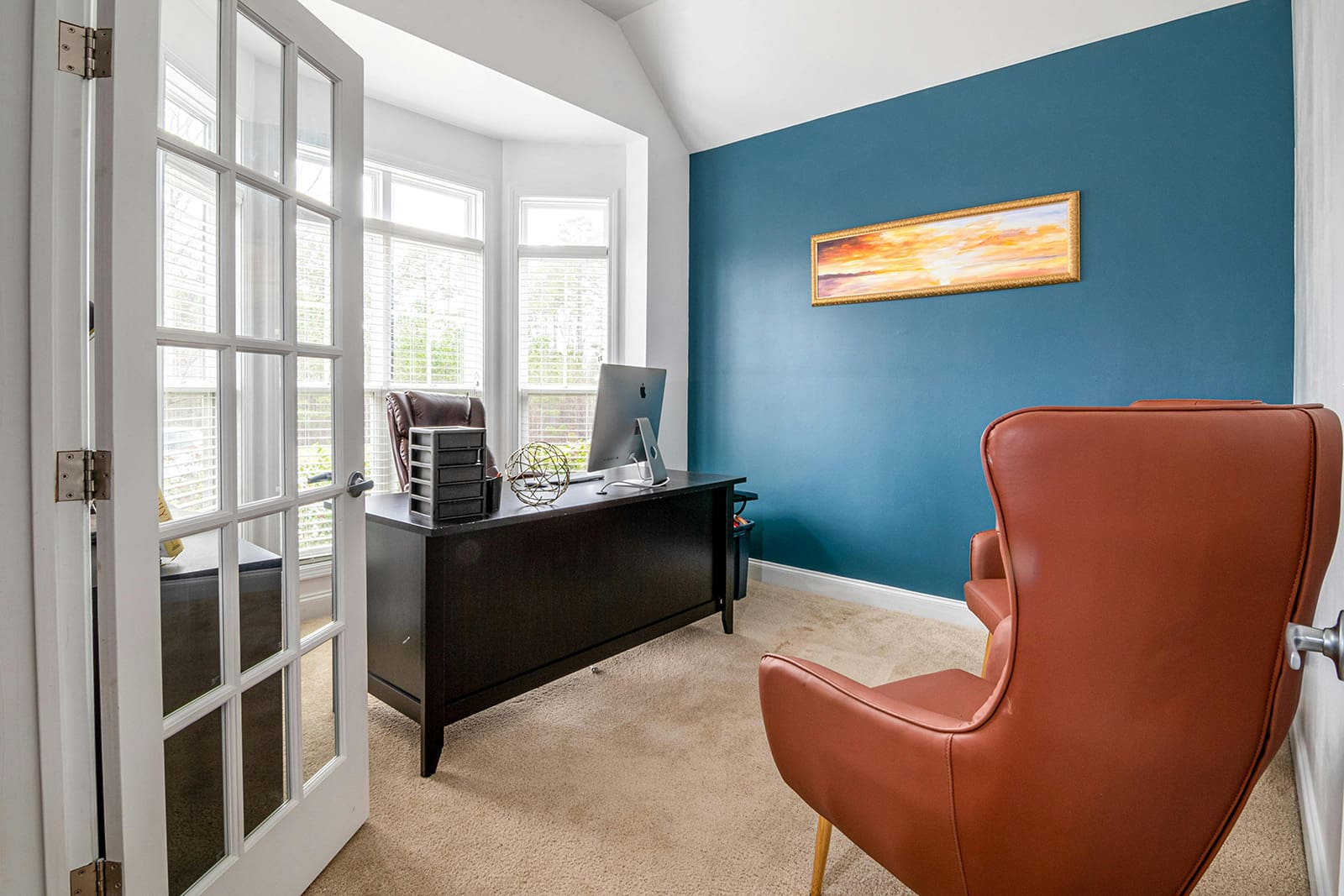 blue accent wall in home office renovated by decorators