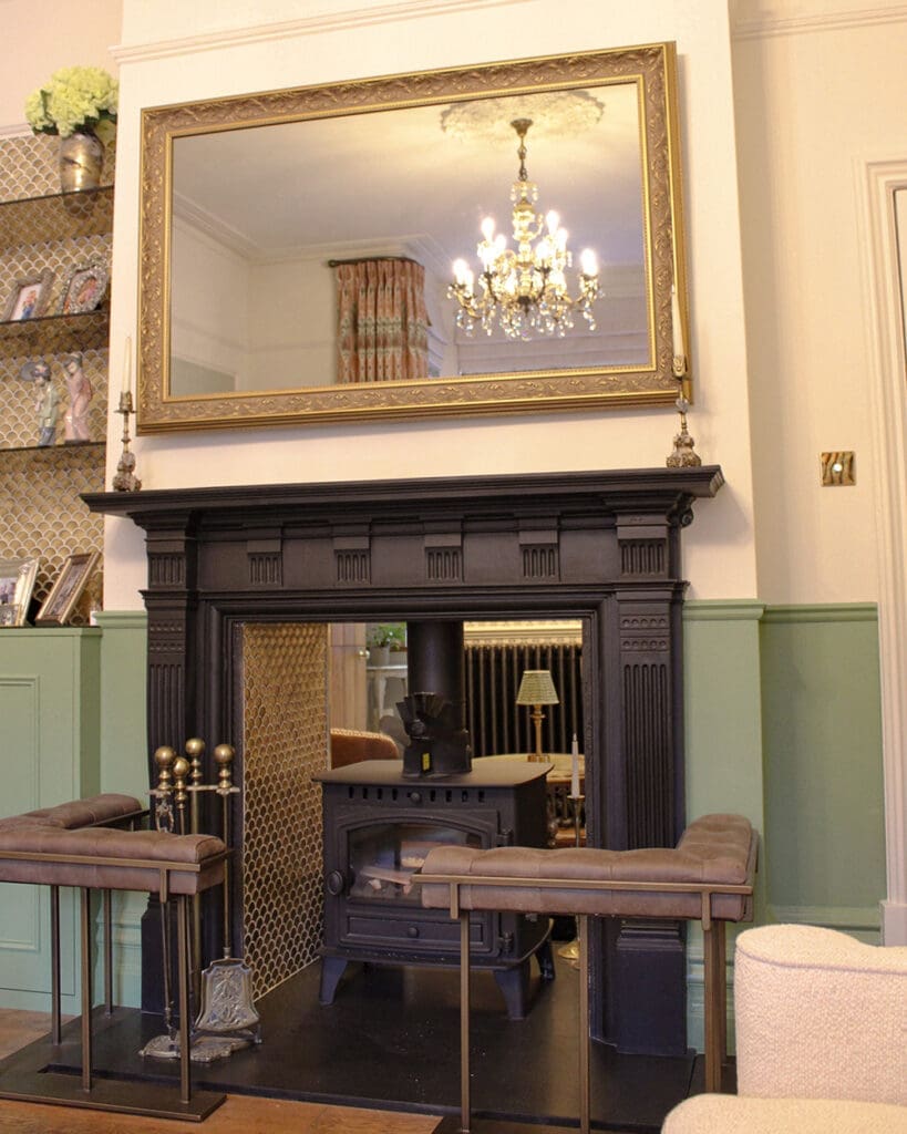 wall panelling and interior painting around fireplace in West Sussex