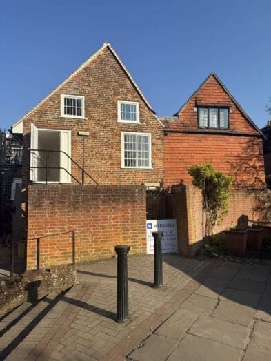 back entrance drainage issues resolved and rebuilt sections of the wall