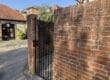 Restoring brickwork and repainting gate