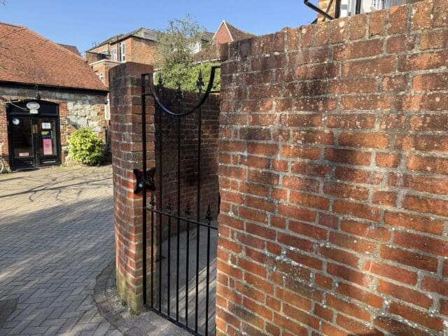 Restoring brickwork and repainting gate