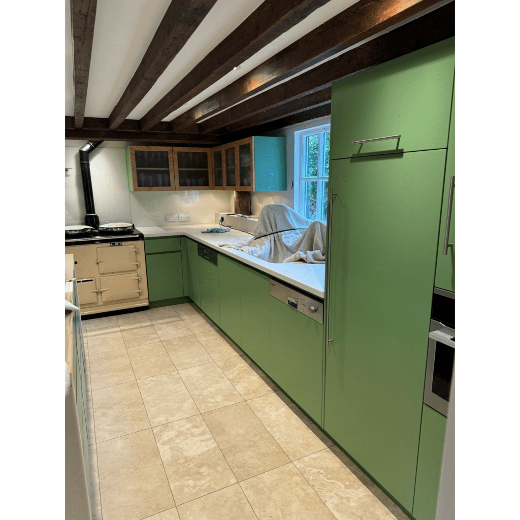 image012 open-plan kitchen with green painted cabinets